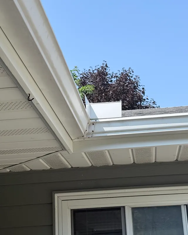 The same gutter bright white after JetKing gutter brightening