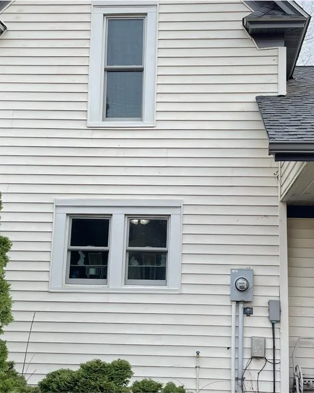 The same side of the house clean after a JetKing house wash