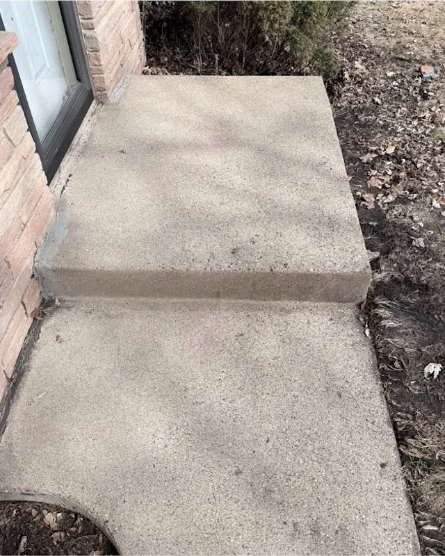 The same concrete step light and clean after JetKing pressure washing