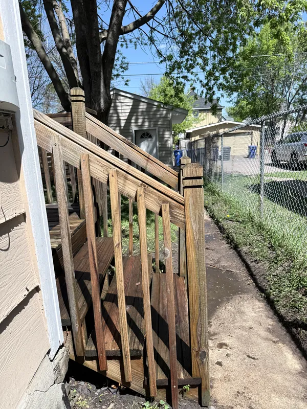 Wood deck stairs and railing after washing